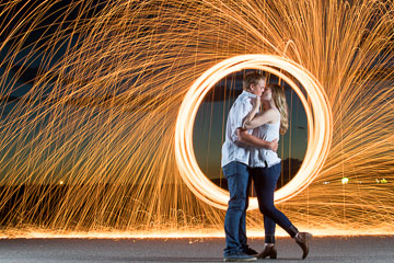 fireworks spin around creative couple for their engagement